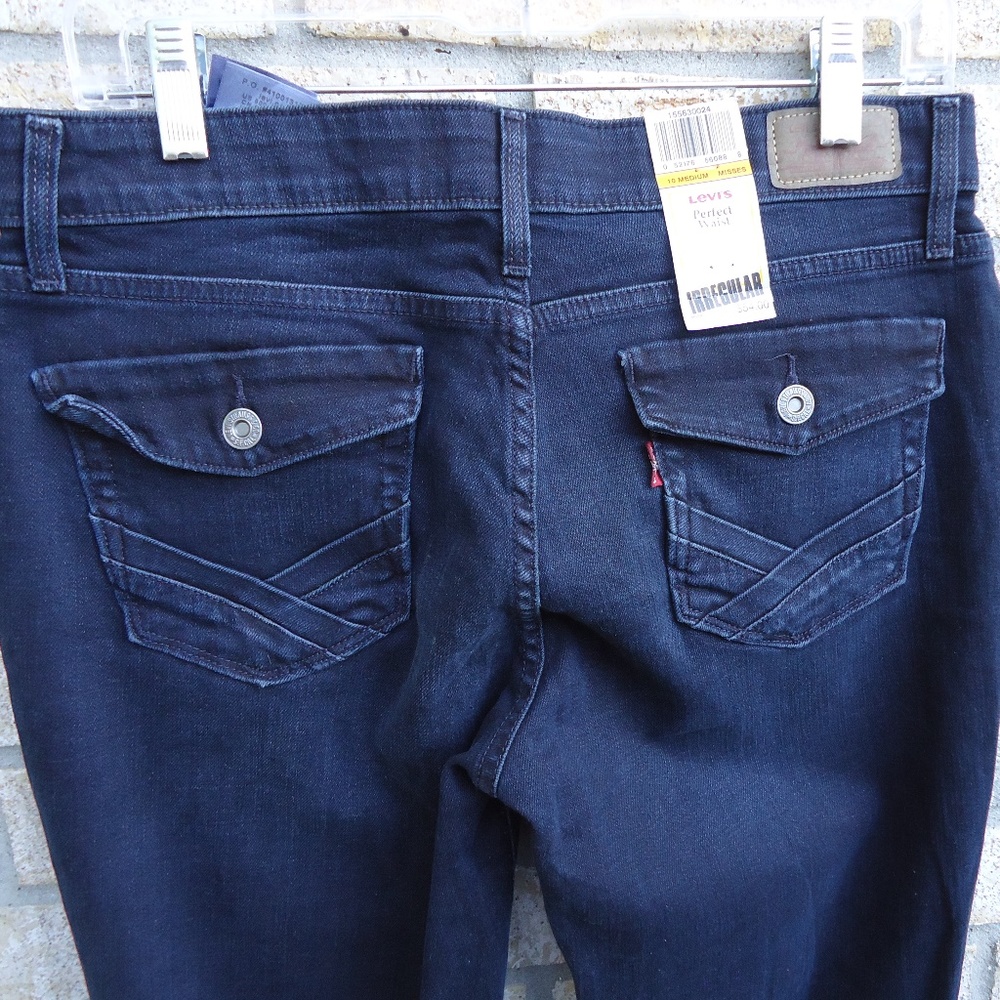 SIZE 10. NWT. LEVI'S 525 boot cut irregular dark wash jeans.